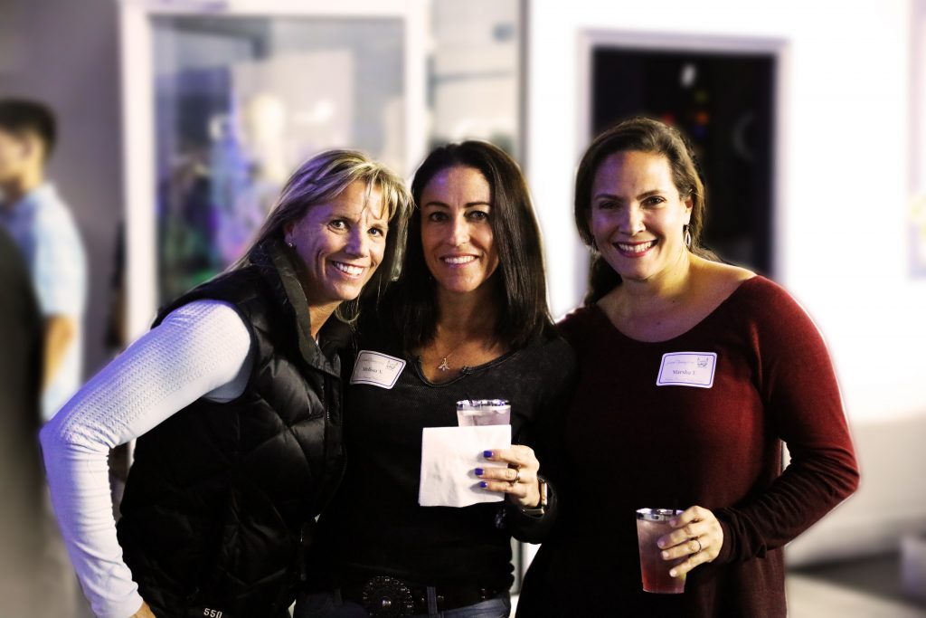 three women enjoying the party